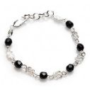 Mattenklopper armband met zwarte Surinaamse kralen | Surinaamse armband | Ogri ai armband