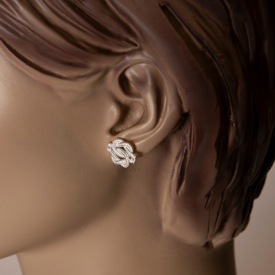 Surinaamse mattenklopper oorbellen | Mattenklopper oorknoppen