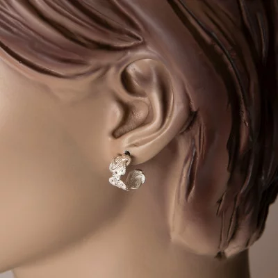 Mattenklopper oorbellen zilver | Surinaamse sieraden kinderen | Surinaamse sieraden dames