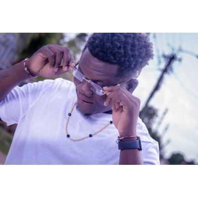 Gouden Surinaamse heren ketting zwarte kralen | Lontai ketting ogri ai