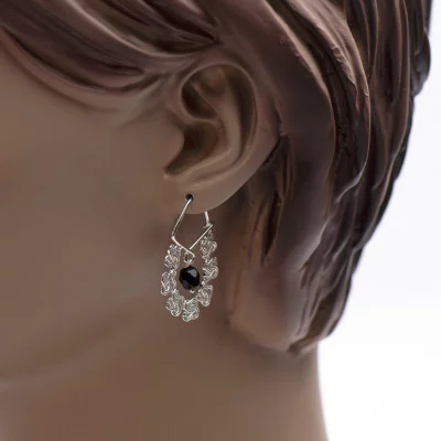 Ronde mattenklopper oorbellen | Surinaamse oorbellen | Surinaamse sieraden